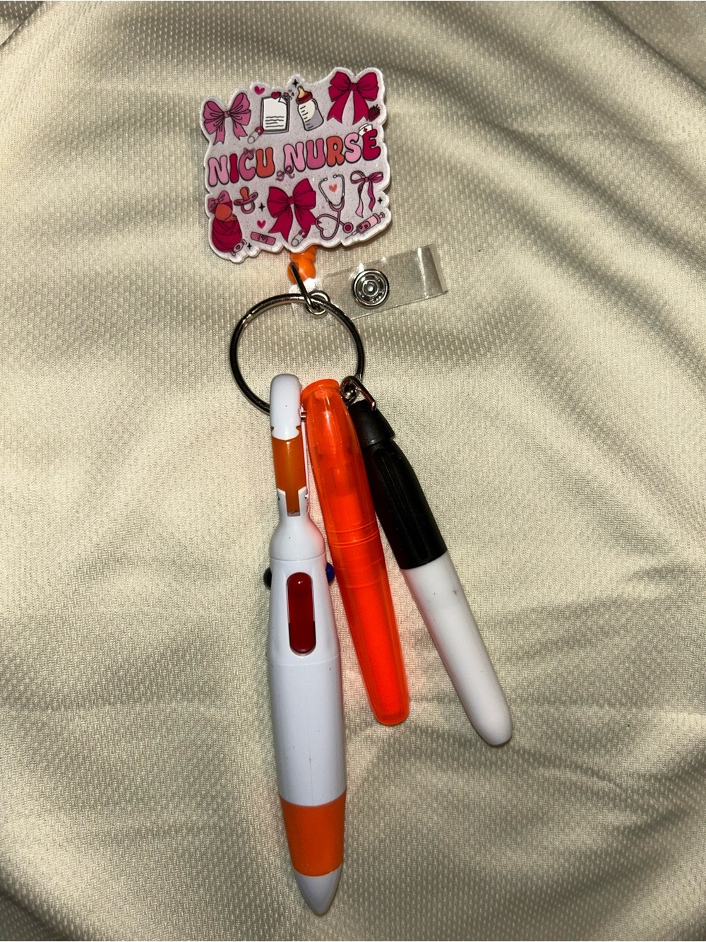 Hand Crafted NICU Nurse Badge Reel with Orange, White, Black Accents